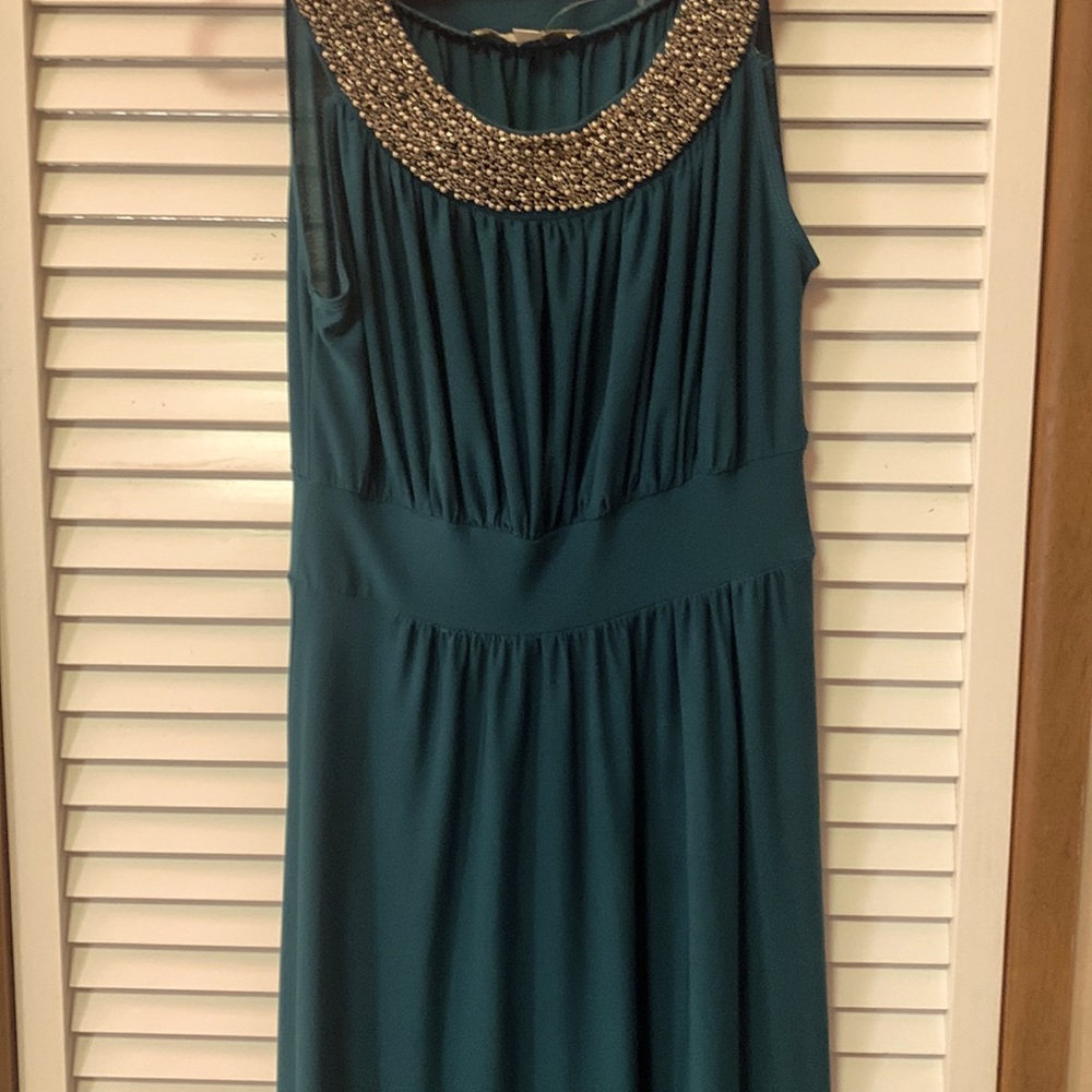 small hunter green sandiva dress- never worn- with a beaded neck line